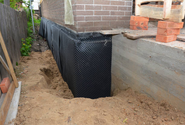 SJ Waterproofing Pros technician performing targeted Emergency Waterproofing assessment in Glencoe, IL